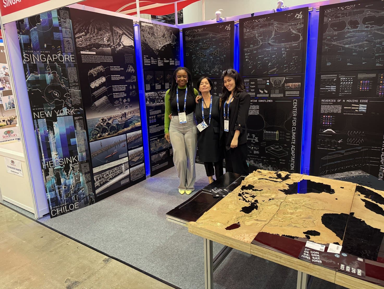 The exhibition team with the territorial model