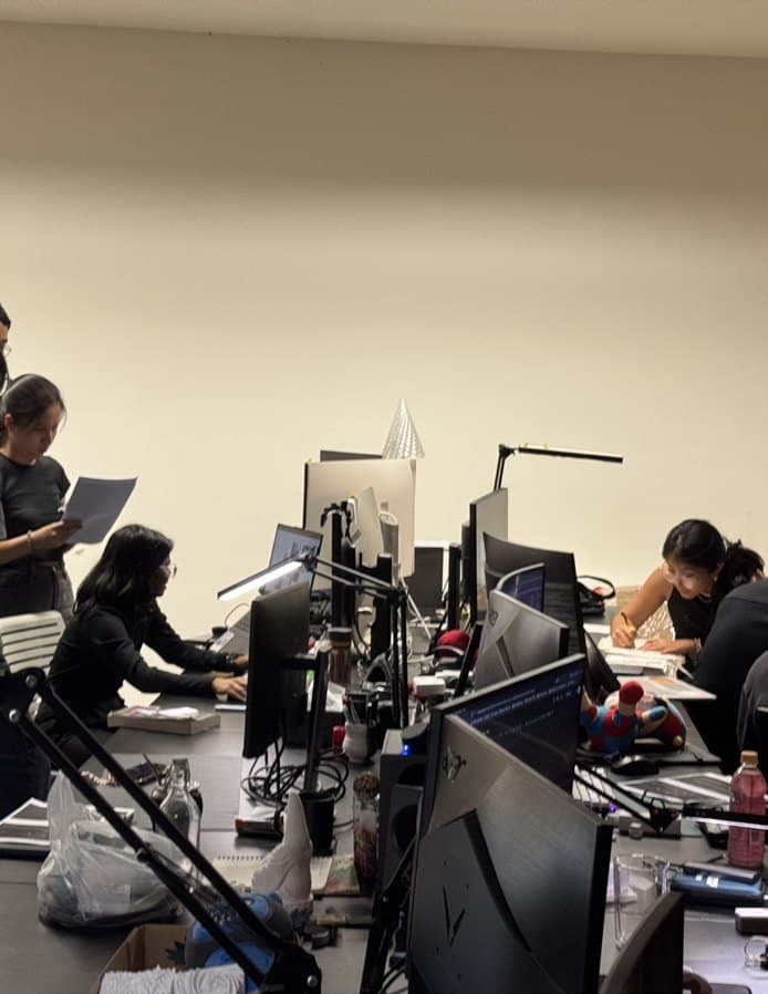 Studio discussion around the screen